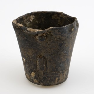 Pewter cup, cup holder soil found tin metal, poured Pewter cup Conical shape stand. Remnants of narrow standing ear. Decorated