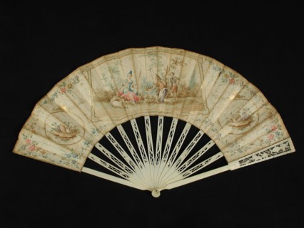 Folding fan with carved ivory frame and multicolored painted parchment leaf with rococo motifs and pastoral scene, folding fan