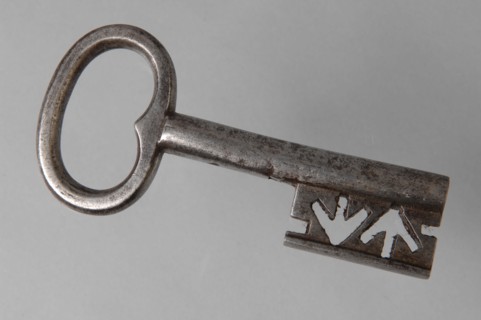 Iron key with heart-shaped eye, hollow key handle and cruciform beards in beard, key iron iron, hand forged Key with heart