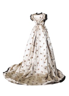 Court coat of cream-colored silk satin, embroidered with multi-colored sprinkler of violets and trimmed at the neckline and