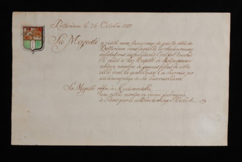 Handwritten sheet with French text about Napoleon's visit to Rotterdam, magazine accompanies donation of ladies watch