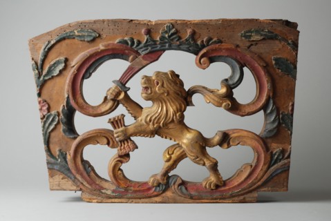 Wooden ornament of wagon with standing lion with sword and arrows bundle, ornament part wood carving sculpture sculpture wood
