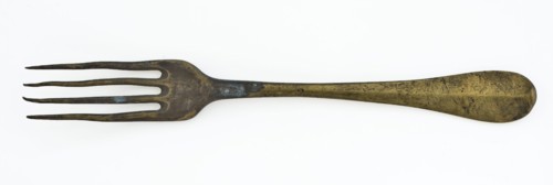 Copper fork with four long teeth and flat handle with rounded end, fork cutlery soil find copper metal, archeology Rotterdam