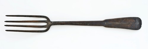 Copper fork with four long teeth and flat handle with spatula-shaped end, fork cutlery soil find copper metal, archeology City