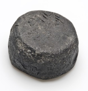 Lead weight, rough conical in shape, weight soil finding lead metal, cast Coarse formed lead weight. Conical in shape