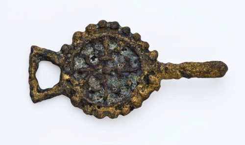 Rosette-shaped coat hook or coat closure with triangular eye and hook, closure clothes accessory clothing soil find copper metal