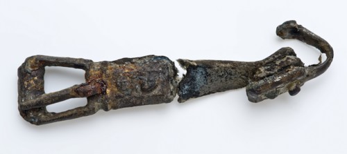 Buckle with leather belt, attachment and end of hook, buckle fastener component soil find copper leather metal, deformed state