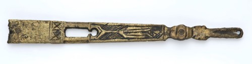 Brass tongue, long and narrow, ending in an oval eye, engraved decoration, fitting belt accessory soil find copper brass metal
