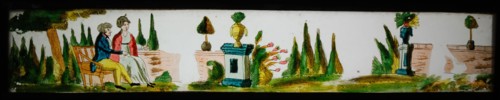Hand-painted lantern plate in tin mount, image of man and woman in garden, slide plate slideshope images glass paper tin, Hand