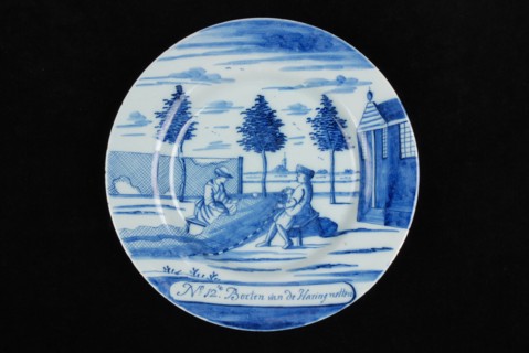 Manufacturer: De Porceleyne Bijl, Series of twelve plates with blue herring industry scenes: No 12. The Fines of the Herringnets