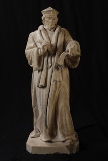 sculptor: Leo Paulus Johannes Stracké, Standing statue of Erasmus with book and quill pen in hand, sculpture sculpture sandstone
