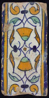 Border tile, flower decoration in blue, yellow and green, upper and lower edge blue and yellow, border tile wall tile tile