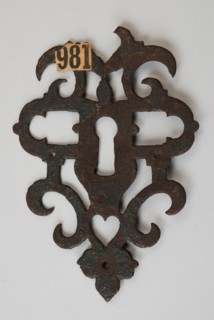 Iron key plate, finished with ajour decor, in renaissance band and scroll ornamentation, keyplate cover plate finishing iron