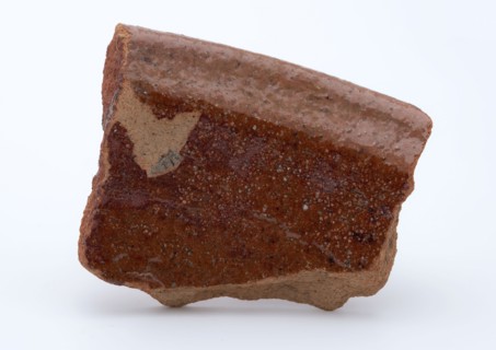 Fragment of red earthenware, partly glazed, fragment crockery holder kitchenware earth discovery ceramic earthenware glaze lead