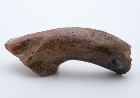 Fragment of red earthenware, partly glazed, fragment crockery holder kitchen utensils earthenware ceramics earthenware glaze