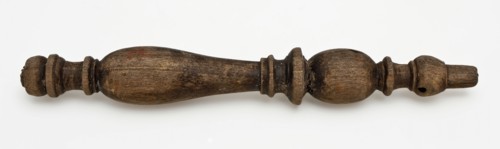 Twisted wooden bobbin, ornament artefact tools equipment soil finds wood, sawn turned wood Wooden spool or stick Fully decorated
