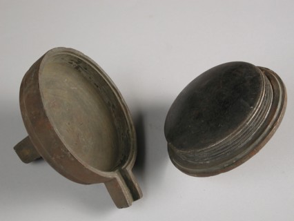Two-piece bronze mold for lid of griddle or butter pot, cast molding tool tools base metal bronze, cast twisted Two-piece bronze