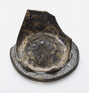 Fragment of soil, part of stand ring and wall of smooth drinking cup, drinking cup drinking utensils holder soil find glass