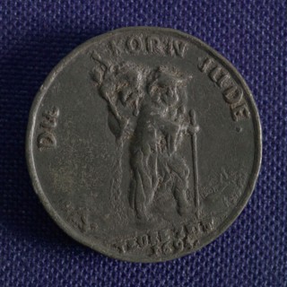 Medal on the increase of grain prices in Germany, medallion medals lead metal, man walking to the right carrying bag