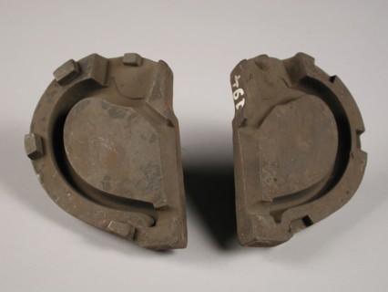 Two parts of three-piece bronze mold for ear of pot or jug, mold casting tool tools equipment base metal bronze, cast Three