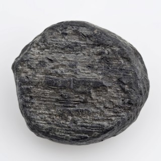 Lead disk, disc artefact foundations lead metal, gram cast Loden disc Smooth side and very rough silk with the structure of wood