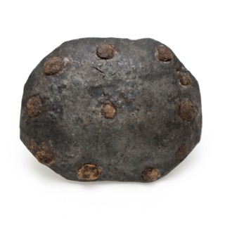 Eight-edged globe herd containing wood remnants, held by eleven nails, herd ground find lead wood iron metal, hand-forged cast
