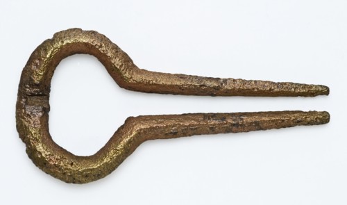 Mouth harp, eye with two pointy teeth, Mouth-harp musical instrument sound medium soil find bronze metal, cast Mouth harp Eye