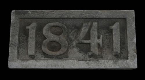 Facade stone with date 1841, facing brick foundation stone building stone stone, chopped Rectangular frame and year in high