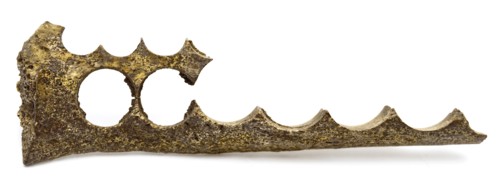 Legs block with row of holes, residue of button fabrication, waste soil found leg, drilled Fragment leg in which round holes