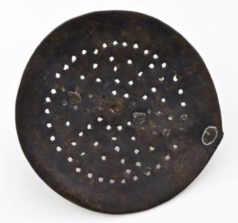 Skimmer with an iron handle, skimmer kitchenware soil find brass iron metal, archeology Rotterdam rail tunnel cake food prepare