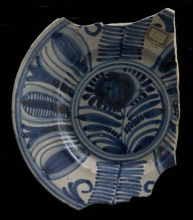 Fragment plate, blue on white, Chinese inspired floral motifs, underside white with blue stripe, plate dish crockery holder