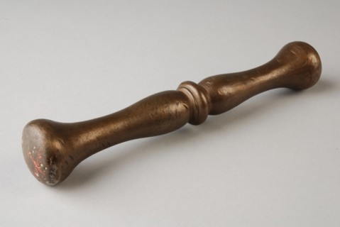 Bronze stamper, pestle tools equipment bronze, cast Pestle: round stem with central node. Bolls on both sides of node.