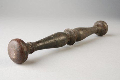 Bronze stamper, pestle tools equipment bronze, molded Pestle: round handle with profiled node in the middle. Bolls on both sides