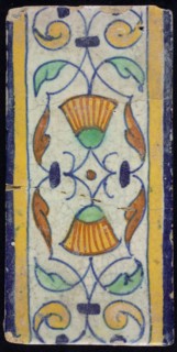 Border tile, flower decoration in blue, yellow and green, upper and lower edge blue and yellow, border tile wall tile tile