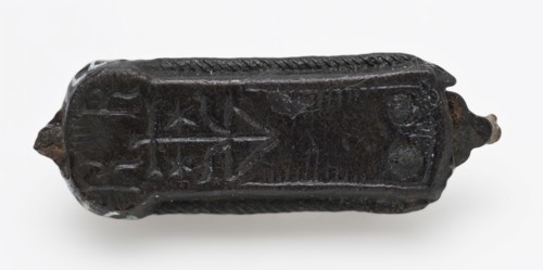 Elongated fittings with private label, batter ground find tin iron metal, cast Oblong hewn Decorated in high relief on one side