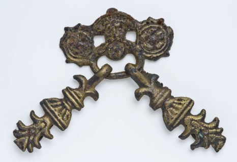 Brass belt buckle or belt hanger embossed in relief: man's head, flowers and vases, belt fittings clothing accessory clothing