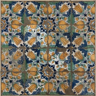 Tile field of sixteen pieces, four high, four wide; tulip, orange apple, bunch of grapes, acorns and marigolds, tile field wall