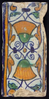 Border tile, flower decoration in blue, yellow and green, upper and lower edge blue and yellow, border tile wall tile tile