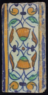 Border tile, flower decoration in blue, yellow and green, upper and lower edge blue and yellow, border tile wall tile tile
