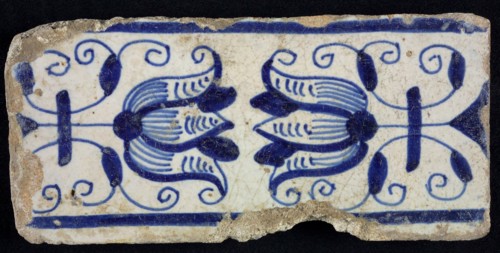 Blue border tile, waving floral pattern with tulips, above and below blue border, border tile wall tile tile sculpture ceramic