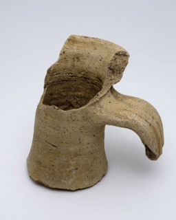 Neck fragment of jug with part of rim and ear, amphora jar holder soil find ceramic pottery, hand-turned baked neck fragment