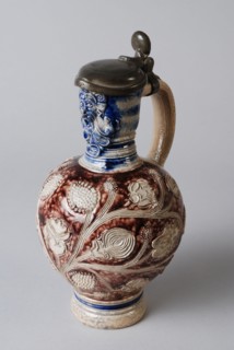 Tinsmith: A? S, Stoneware jug be glazed with tin lid, sgraffito and appliqués, blue and purple, jug crockery holder soil find