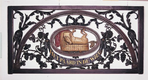 Carved cross-light and entitled: The Horse in the Cradle, cutting frame light wood carving sculpture sculpture building part