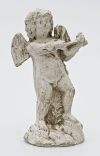Pipes, statue, angel, putti or amor with bow and arrow, sculpture footage earth discovery ceramic earthenware pipe earth