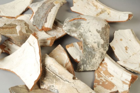Fragments of earthenware pipe pots from the waste pit of Rotterdam pipe maker Hendrick Jansz, pipe pot holder soil found ceramic