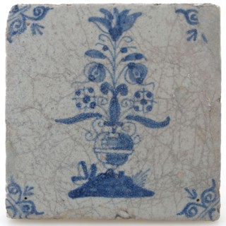 Pottery tile with flower vase and ox head corner decoration in blue on white background, wall tile tile visualization earth