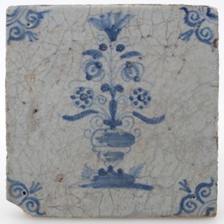 Pottery tile with flower vase and ox head corner decoration in blue on white background, wall tile tile visualization earth