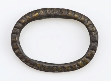 Brass oval buckle, decorated around with battles, buckle fastener component soil find brass metal, archeology Rotterdam