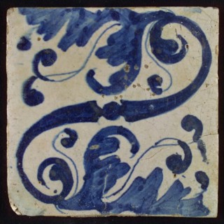 Tile, blue on white, diagonally an S-shaped volute and stylized leaf ornaments, tile picture footage fragment ceramics pottery