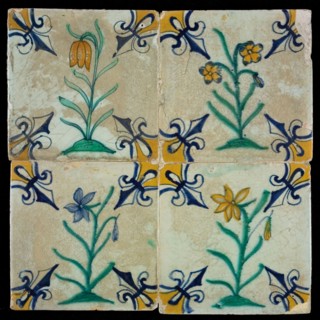 Tile field, four tiles with floral decor, flower on ground, yellow, green and blue on white, corner pattern lily, tiled field
